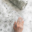 Серебряные снежинки на белом еврофатине